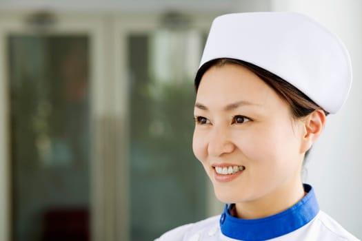 Close-up of a female nurse smiling
