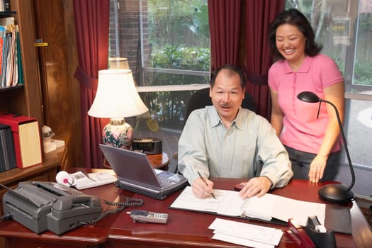 Portrait of a senior man and a mature woman smiling