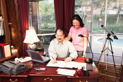 High angle view of a senior man and a mature woman