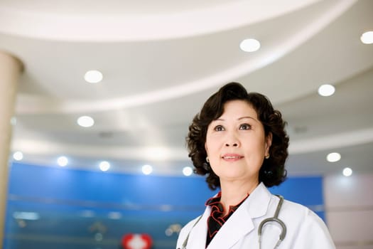 Close-up of a female doctor with a stethoscope around her neck