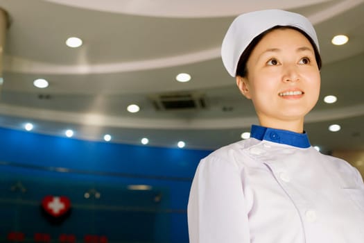 Close-up of a female nurse smiling