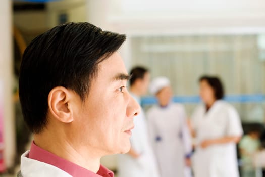 Side profile of a doctor