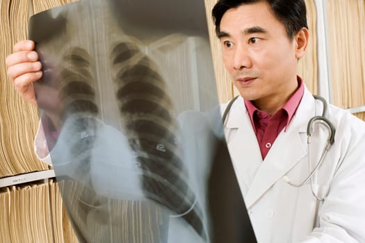 Close-up of a doctor looking an X-Ray image