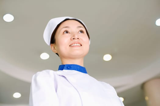 Close-up of a female nurse smiling