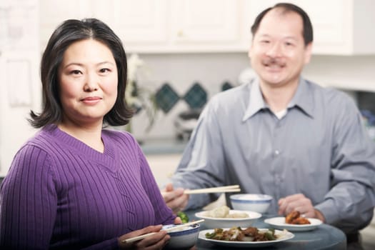 Portrait of a couple eating food