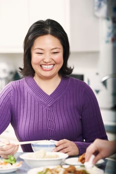 Close-up of a mature woman sitting at the table