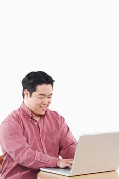 Close-up of a businessman using a laptop
