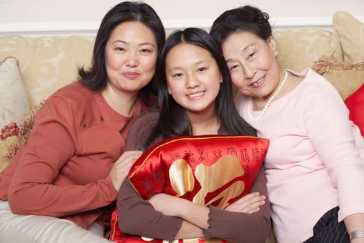 Portrait of a girl with her mother and her grandmother