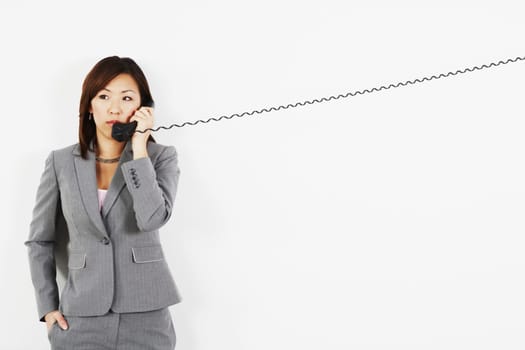 Businesswoman talking on the telephone