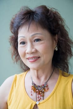Senior woman smiling and looking away