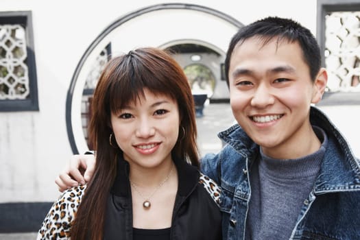 Portrait of a young couple smiling