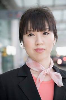 Close-up of a female cabin crew looking away