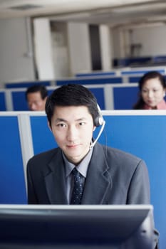 Portrait of a businessman wearing a headset