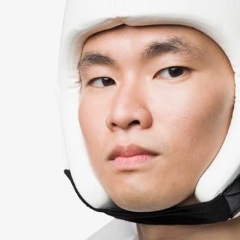 Portrait of a young man wearing a sports helmet