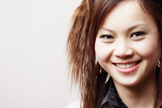 Portrait of a young woman looking cheerful