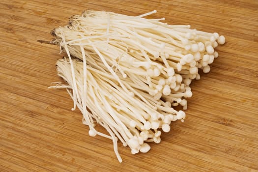 Enoki Mushroom, close up and studio shot of fungus