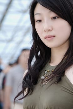 Close-up of a young woman thinking
