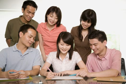 Office workers discussing in meeting