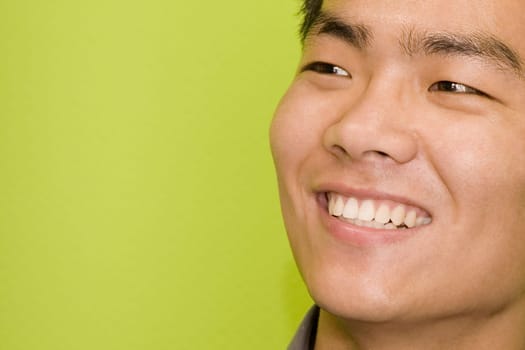Close-up of a male office worker smiling
