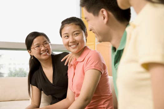 Three office workers smiling