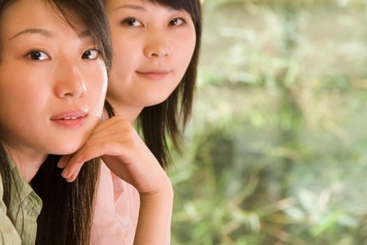 Portrait of two female office workers
