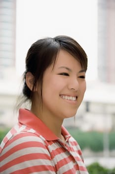 Close-up of a young woman smiling