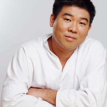 Portrait of a mid adult man wearing a karate uniform