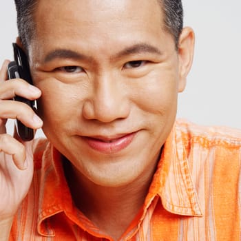 Portrait of a mid adult man using a mobile phone