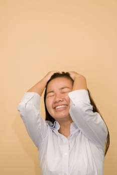 Close-up of a young woman suffering from a headache