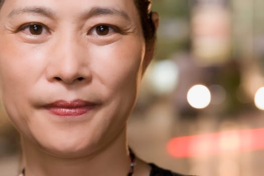 Portrait of a mature woman smirking