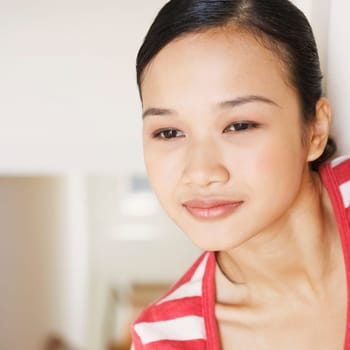 Close-up of a young woman smiling
