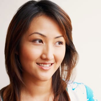 Close-up of a young woman smiling