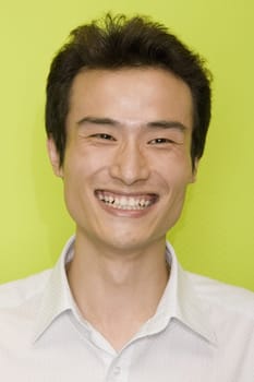 Close-up of a young man smiling