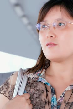 Close-up of a mid adult woman thinking