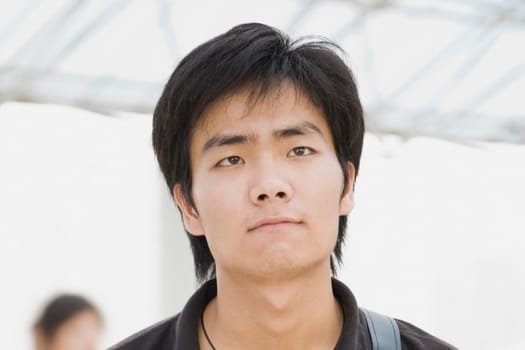 Close-up of a young man thinking
