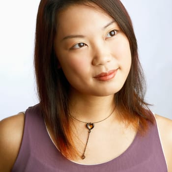 Close-up of a young woman looking sideways