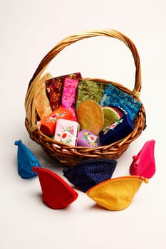 High angle view of a heap of purses in a wicker basket