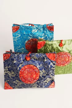 Close-up of three hand bags