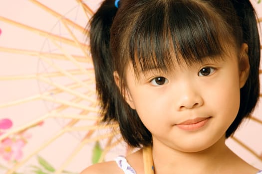 Portrait of a girl with a parasol