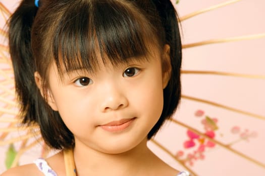 Portrait of a girl with a parasol
