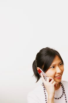 Young woman talking on a mobile phone