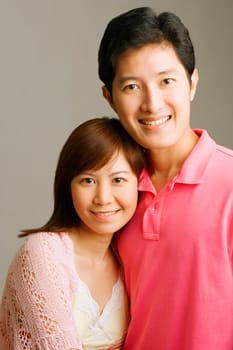 Portrait of a young couple smiling
