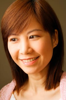 Close-up of a young woman smiling