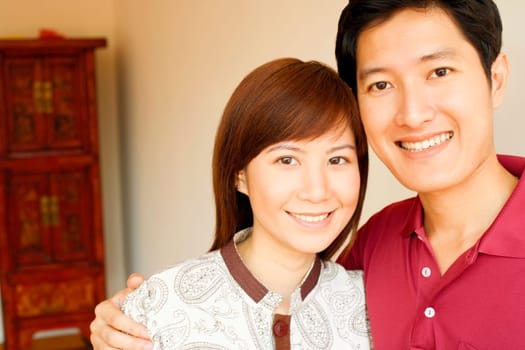 Portrait of a young couple smiling
