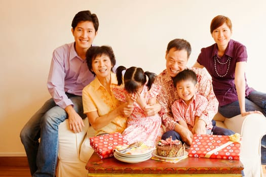Close-up of a family celebrating a birthday party