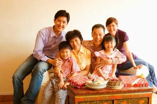 Portrait of a family celebrating a birthday party