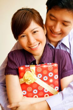 Close-up of a young couple smiling