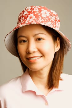 Portrait of a young woman wearing a hat