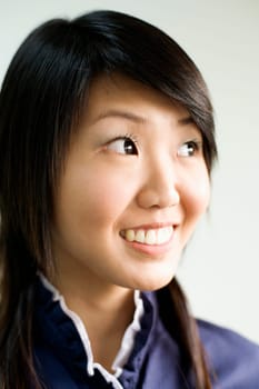 Close-up of a young woman smiling