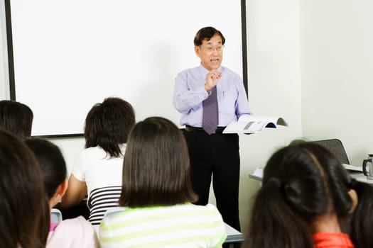Teacher teaching in a classroom